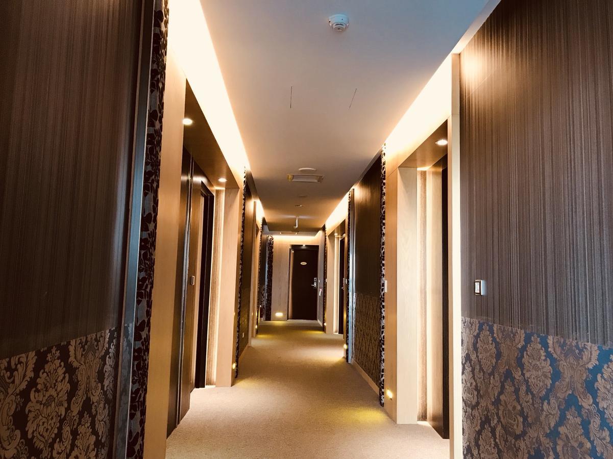 Yunlin Commerce Ryokan Tuku Extérieur photo