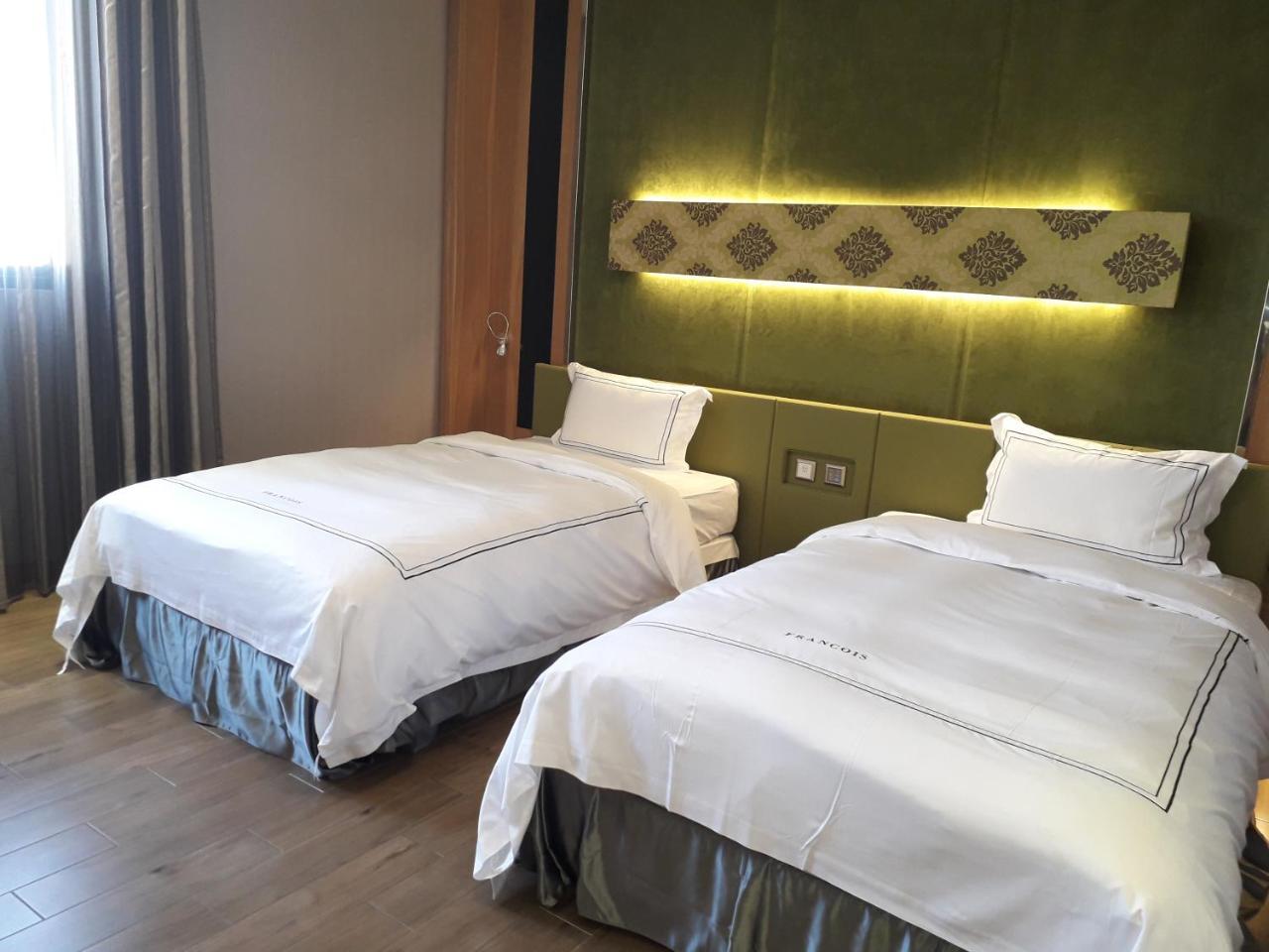Yunlin Commerce Ryokan Tuku Extérieur photo